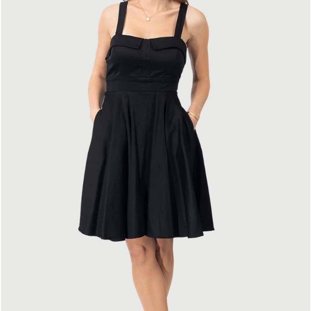 Eva Rose pin up dress; pockets. Only tried on, never worn. Fits a size 8 dress.